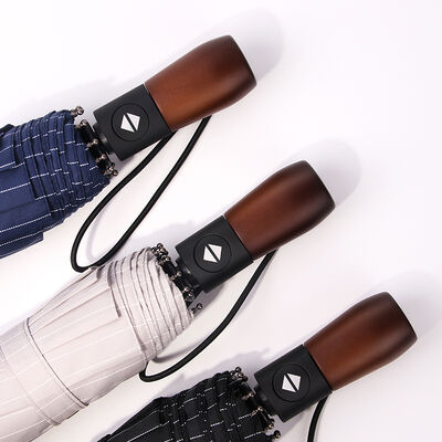 ২৩ ইঞ্চি ৩ ভাঁজ স্বয়ংক্রিয়ভাবে খোলা এবং বন্ধ হওয়ার কাঠের হাতলযুক্ত ছাতা